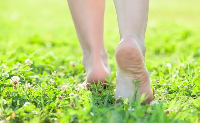 What causes dark spots under your feet?